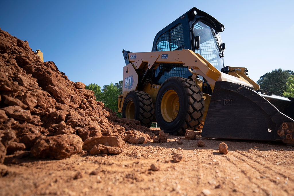 Compact Track Loader moving dirt
